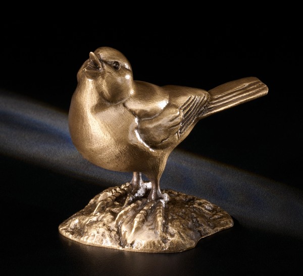 Vogel, stehend auf Sockel